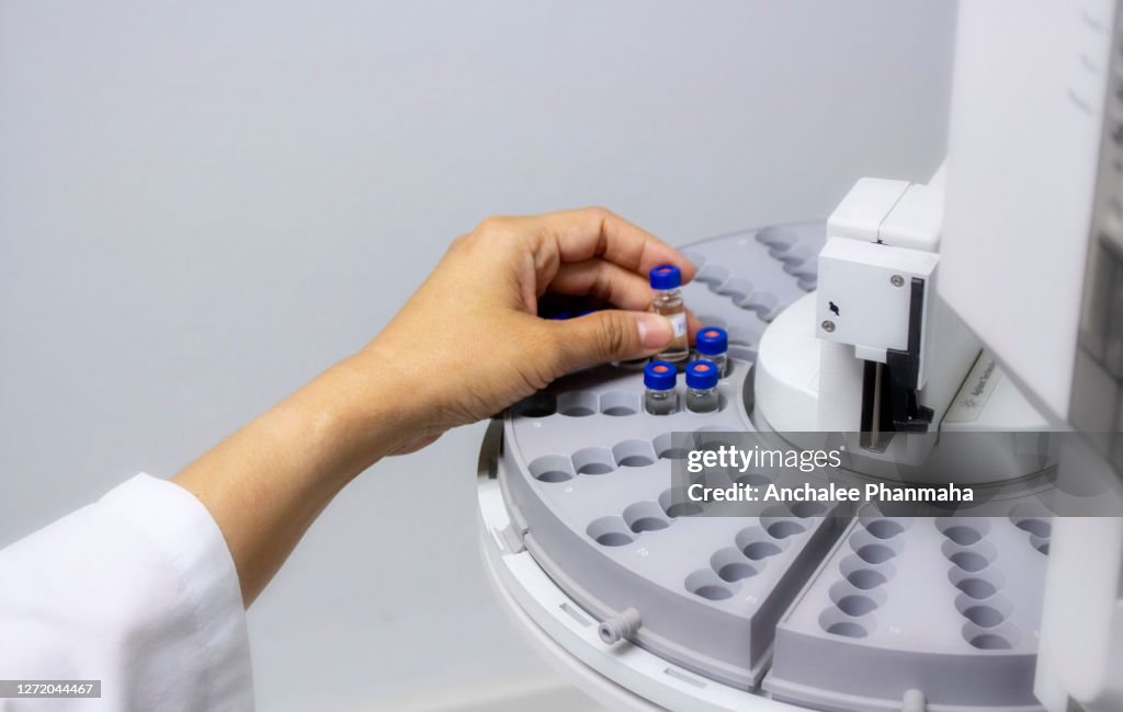 Loading Sample Into Gc Machine Laboratory Concept Close Up Picture Of Hand Is Putting The Sample Vial ...
