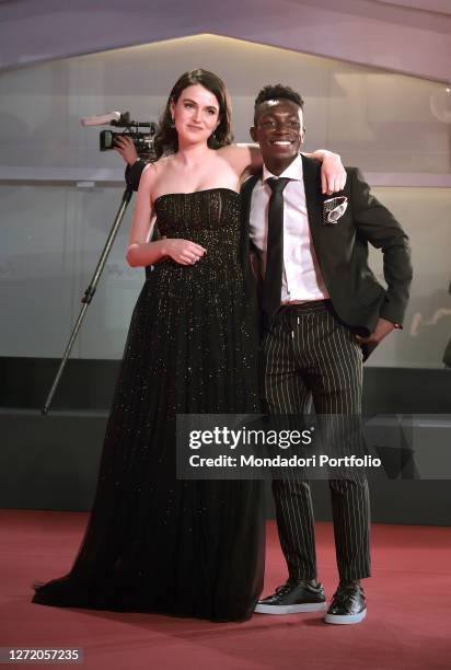 American actors Catherine Davis, Olly Sholotan at the 77 Venice International Film Festival 2020. Run Hide Fight red carpet. Venice , September 10th,...