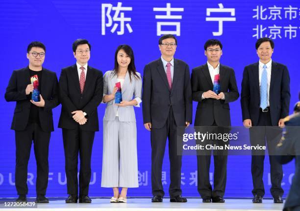 Kai-Fu Lee , chairman and chief executive officer of Sinovation Ventures, Beijing Mayor Chen Jining and Xiaomi CEO Lei Jun attend HICOOL Global...