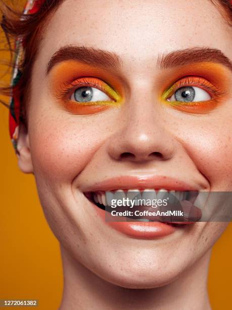 natural tongue open mouth. bright make-up - fashion orange colour stock pictures, royalty-free photos & images