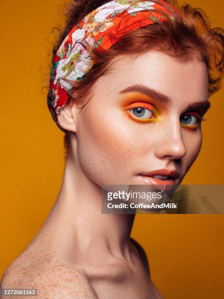 beautiful woman with bright make-up - fashion orange colour stock pictures, royalty-free photos & images