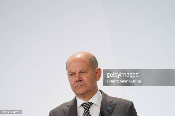 German Finance Minister Olaf Scholz speaks to the media at the conclusion of an informal meeting of European Union ministers for economic and...