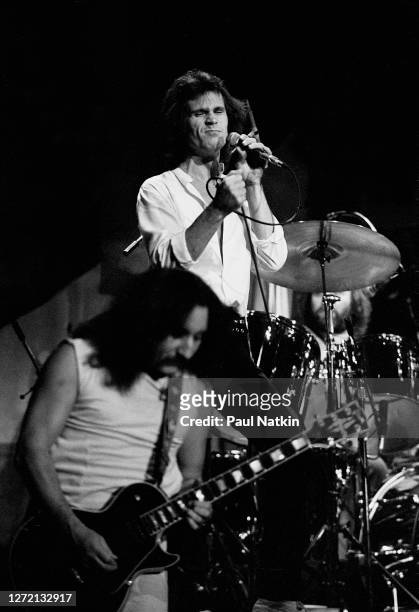 English Rock musicians Mick Box and Peter Goalby, both of the group Uriah Heep, perform onstage at the Park West, Chicago, Illinois, November 29,...