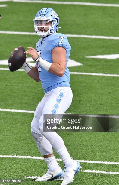 Sam Howell of the North Carolina Tar Heels drops back to pass against the Syracuse Orange during the first quarter of their game at Kenan Stadium on...
