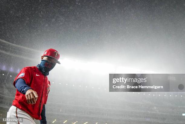 Eddie Rosario of the Minnesota Twins looks on as rain falls against the Cleveland Indians on September 11, 2020 at Target Field in Minneapolis,...