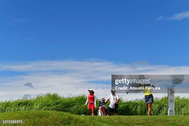 Sakura Koiwai of Japan hits her tee shot on the 5th hole during the final round of the JLPGA Championship Konica Minolta Cup at the JFE Setonaikai...