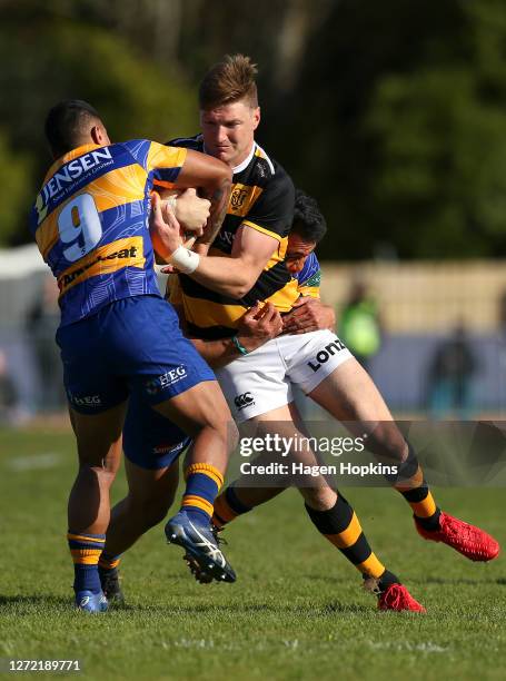 Jordie Barrett of Taranaki is tackled during the round 1 Mitre 10 Cup match between the Taranaki Bulls and Bay of Plenty Steamers at TET Stadium &...