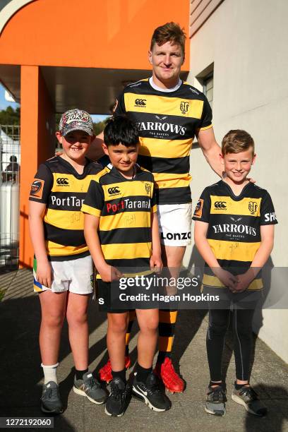 Jordie Barrett of Taranaki poses with young fans after the round 1 Mitre 10 Cup match between the Taranaki Bulls and Bay of Plenty Steamers at TET...