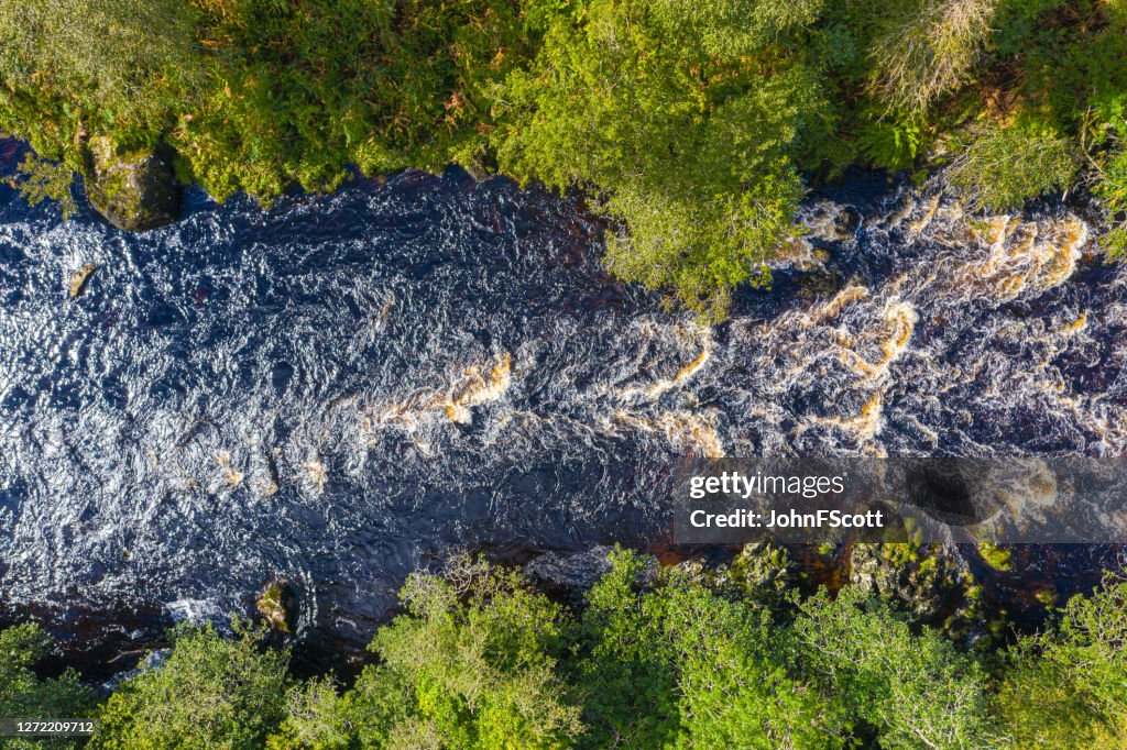 The view from a drone of a river in remote rural Dumfries and Galloway