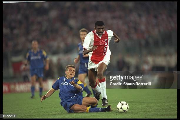 Nwankwo Kanu of Ajax is challenged by Dider Deschkrips of Juventus during the European Cup Final in Amsterdam, Netherlands. The game went to penaltys...