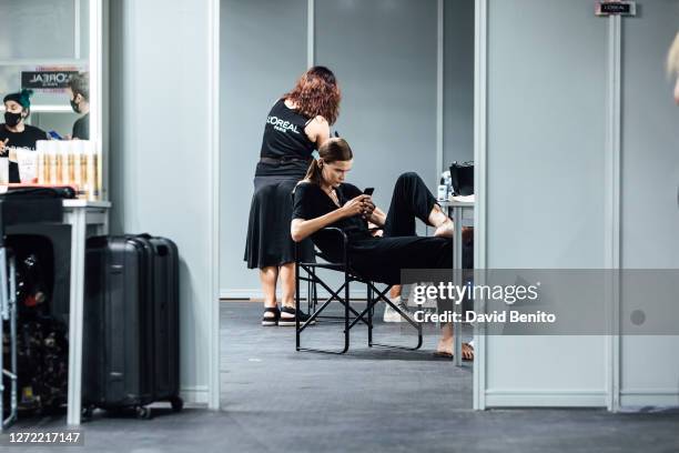 Model is seen at backstage before the Maison Mesa and Custo Barcelona fashion show during Mercedes Benz Fashion Week Madrid Spring/Summer 2021 at...