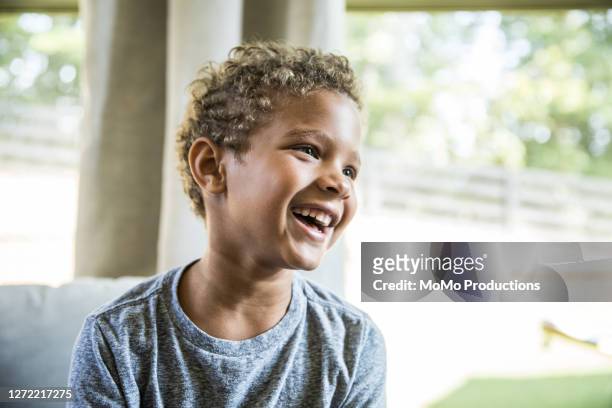 portrait of young boy at home - boys foto e immagini stock