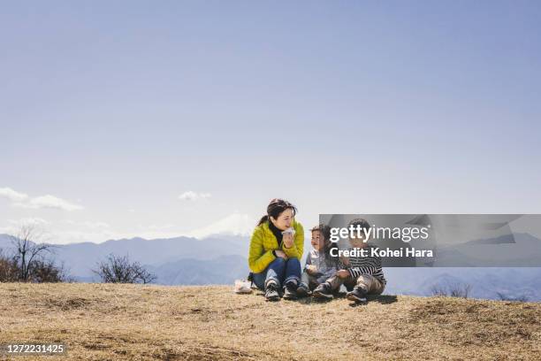 family hiking in the mountain - family at a picnic ストックフォトと画像