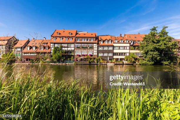 germany, bavaria, bamberg, river regnitz and little venice townhouses in spring - バンベルク ストックフォトと画像