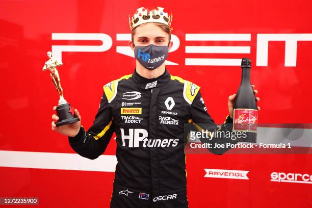 Championship winner Oscar Piastri of Australia and Prema Racing celebrates after the Formula 3 Championship Second Race at Mugello Circuit on...