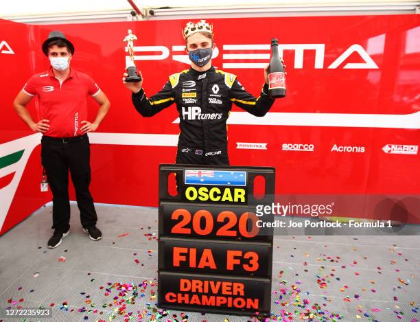 Championship winner Oscar Piastri of Australia and Prema Racing celebrates after the Formula 3 Championship Second Race at Mugello Circuit on...