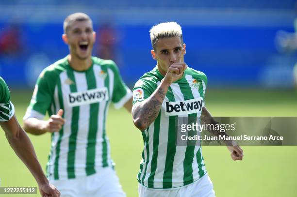 Cristian Tello of Real Betis celebrates after scoring his team's first goal during the La Liga match between Alaves and Real Betis at Estadio de...