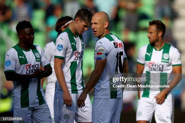 Captain, Arjen Robben of Football Club Groningen speaks to his team mates prior to the Dutch Eredivisie match between FC Groningen and PSV Eindhoven...