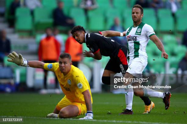 Donyell Malen of PSV looks on as he shoots and scores his teams second goal during the Dutch Eredivisie match between FC Groningen and PSV Eindhoven...