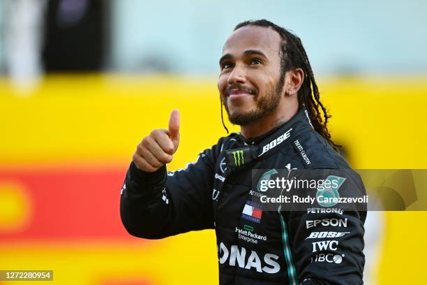 Race winner Lewis Hamilton of Great Britain and Mercedes GP celebrates in parc ferme during the F1 Grand Prix of Tuscany at Mugello Circuit on...