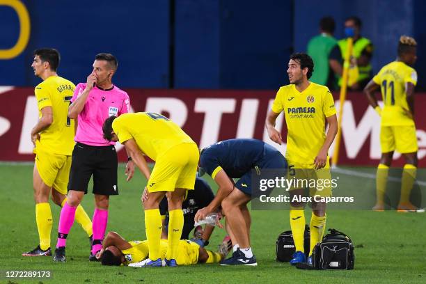 Francis Coquelin of Villarreal CF reacts injured on pitch during the La Liga match between Villarreal CF and SD Huesca at Estadio de la Ceramica on...