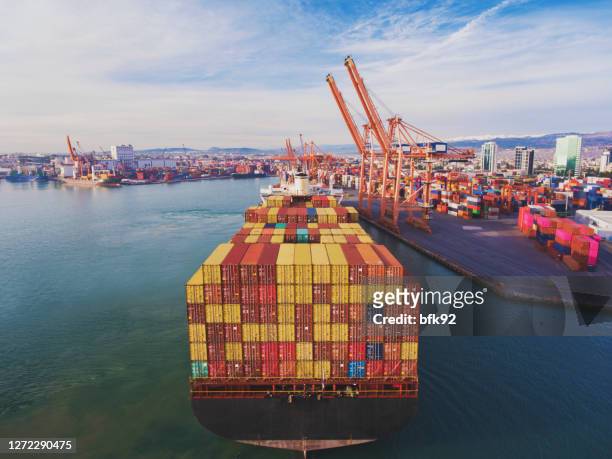 aerial view of cargo ship in transit. - portmiami stock pictures, royalty-free photos & images