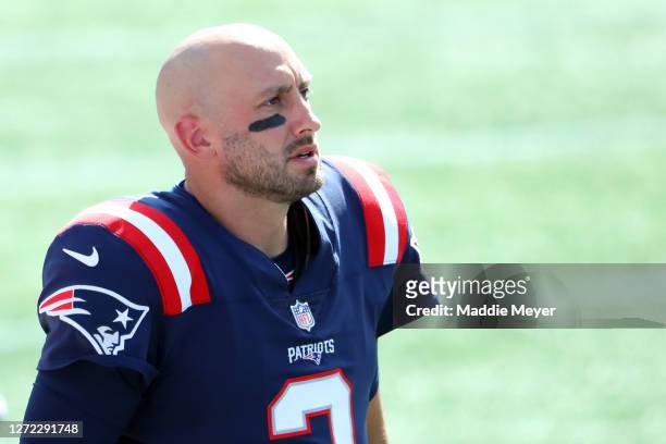 Brian Hoyer of the New England Patriots stands on the sideline during the first half against the Miami Dolphins at Gillette Stadium on September 13,...