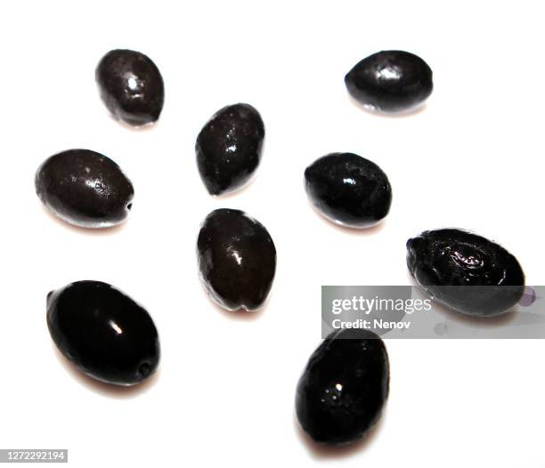 black olive fruits isolated on white background - black olive stock pictures, royalty-free photos & images