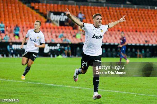 Manu Vallejo of Valencia CF celebrates after scoring his team's fourth goal during the La Liga match between Valencia CF and Levante UD at Estadio...