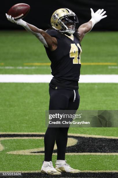 Alvin Kamara of the New Orleans Saints celebrates a touchdown against the Tampa Bay Buccaneers during the second quarter at the Mercedes-Benz...