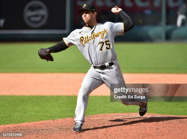 Relief pitcher Austin Davis of the Pittsburgh Pirates throws in the eighth inning against the Kansas City Royals at Kauffman Stadium on September 13,...