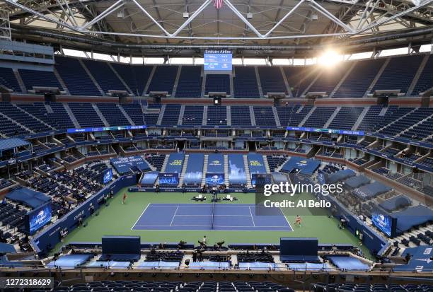 General view of Arthur Ashe Stadium is seen as Alexander Zverev of Germany returns the ball in the third set during his Men's Singles final match...