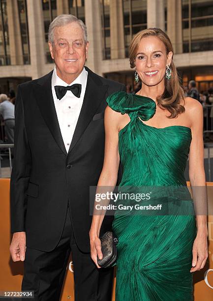 David H. Koch and wife Julia Koch attend the 2011 Metropolitan Opera Season opening night performance of "Anna Bolena" at The Metropolitan Opera...