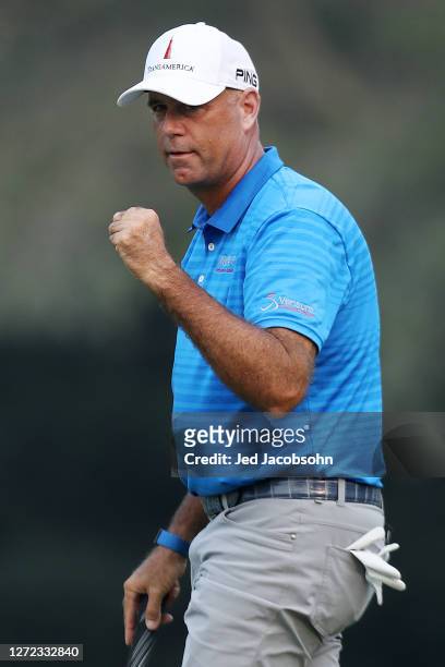Stewart Cink celebrates after his birdie putt on the 18th hole to finish -21 in the final round of the Safeway Open at Silverado Resort on September...