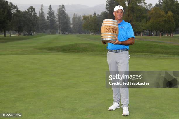 Stewart Cink celebrates with the trophy after winning the Safeway Open at Silverado Resort on September 13, 2020 in Napa, California.