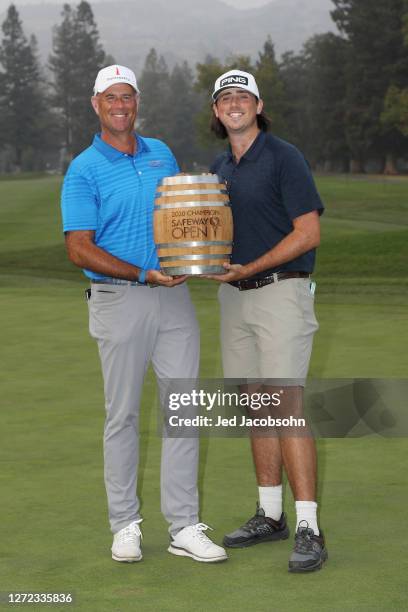 Stewart Cink celebrates with the trophy and his son reagan after winning the Safeway Open at Silverado Resort on September 13, 2020 in Napa,...