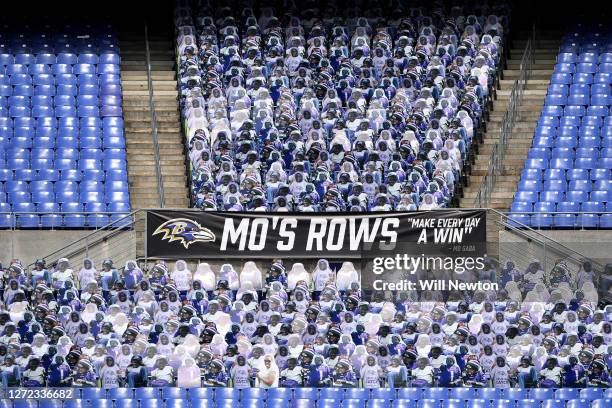 General view of seats filled with cutouts of superfan Mo Gaba during the first half of the game between the Baltimore Ravens and the Cleveland Browns...