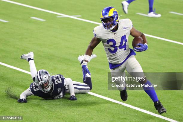 Malcolm Brown of the Los Angeles Rams rushes for a 2-yard touchdown during the third quarter against the Dallas Cowboys at SoFi Stadium on September...