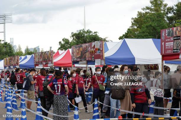 Fagiano Okayama fans gather outside the stadium prior to the J.League Meiji Yasuda J2 match between Fagiano Okayama and Ventforet Kofu at the City...