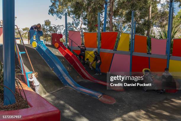 People enjoy the playground at Birrarung Marr on September 14, 2020 in Melbourne, Australia. Metropolitan Melbourne's stage 4 lockdown restrictions...