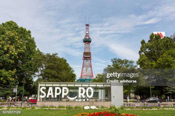 odori park and sapporo tv tower in hokkaido, japan - sapporo stock pictures, royalty-free photos & images