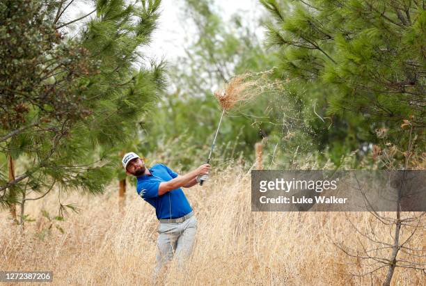 Liam Johnston of Scotland hits his second shot on the 5th hole during Day Four of the Portugal Masters at Dom Pedro Victoria Golf Course on September...