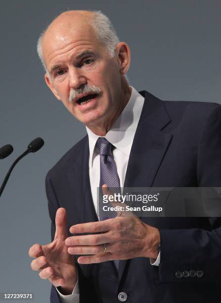 Greek Prime Minister George Papandreou speaks at a convention of the Federation of German Industry to appeal for more German investment in Greece on...