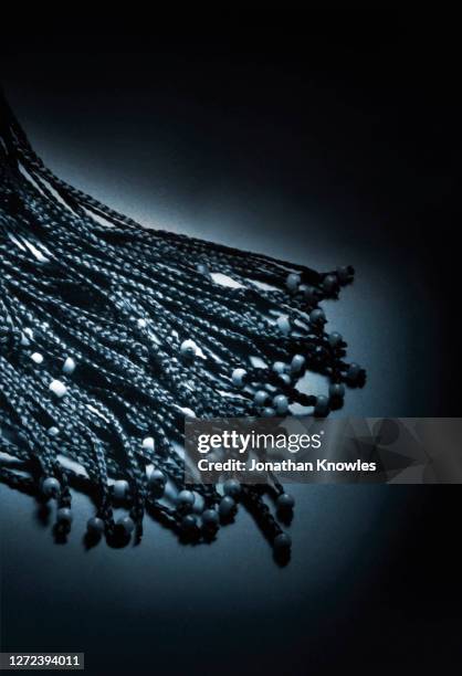 long black braided hair with beads - beads stock pictures, royalty-free photos & images