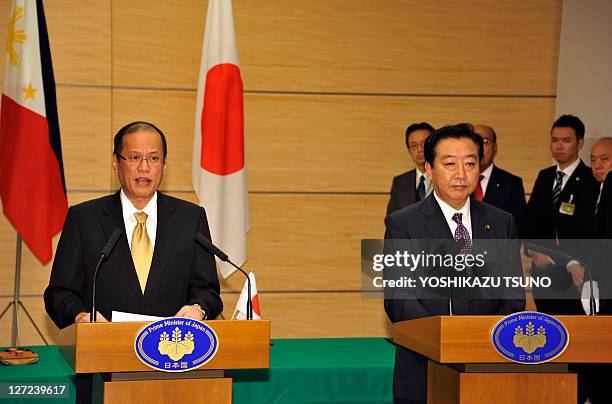 Visiting Philippine President Benigno Aquino and Japanese Prime Minister Yoshihiko Noda speak during a joint statement after signing an agreement at...