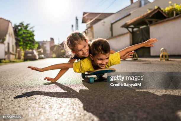 skateboard time - child skating stock pictures, royalty-free photos & images