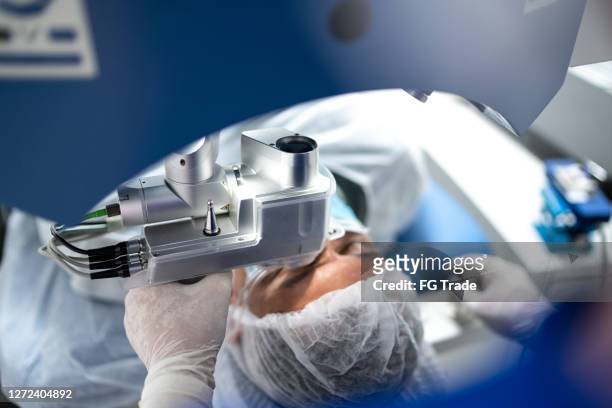 patient on an eye surgery - equipamento cirúrgico imagens e fotografias de stock