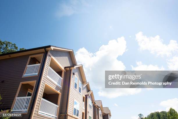 finance and growth construction site - home insurance stock pictures, royalty-free photos & images