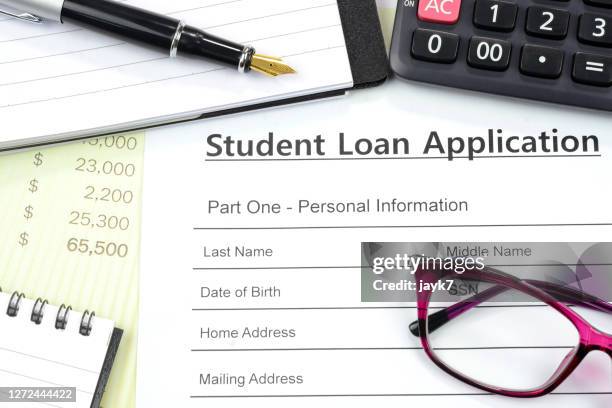 student loan application - us paper currency stock pictures, royalty-free photos & images