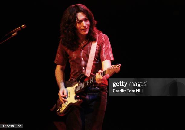 Irish blues guitarist Rory Gallagher performs at the Omni Coliseum on February 8, 1976 in Atlanta, Georgia.